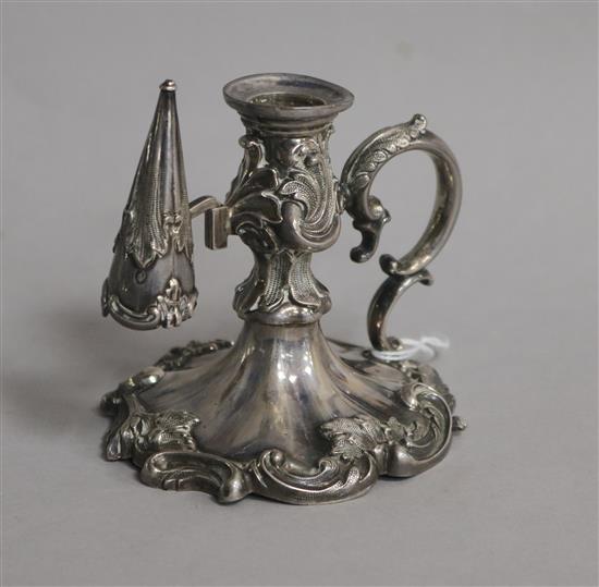 An ornate eatly Victorian silver chamberstick and snuffer by Henry Wilkinson & Co, Sheffield, 1837, 8cm.
